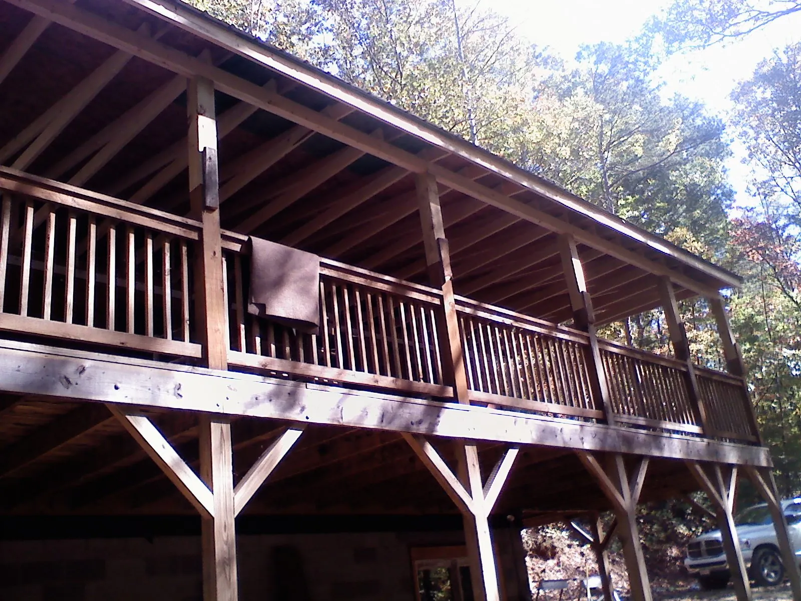 Timber framing under a new elevated porch and deck — Roof Leak Repair in Pike Road by Roofing Brothers
